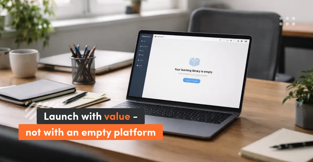 Laptop screen showing an empty LMS learning library with the message “Launch with value—not with an empty platform,” highlighting day-one content readiness for LMS go-live.