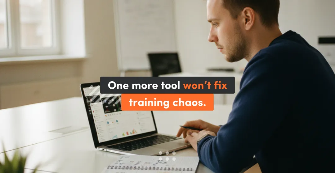 Employee working on a laptop—one more tool won’t fix training chaos without a learning management system for employees.