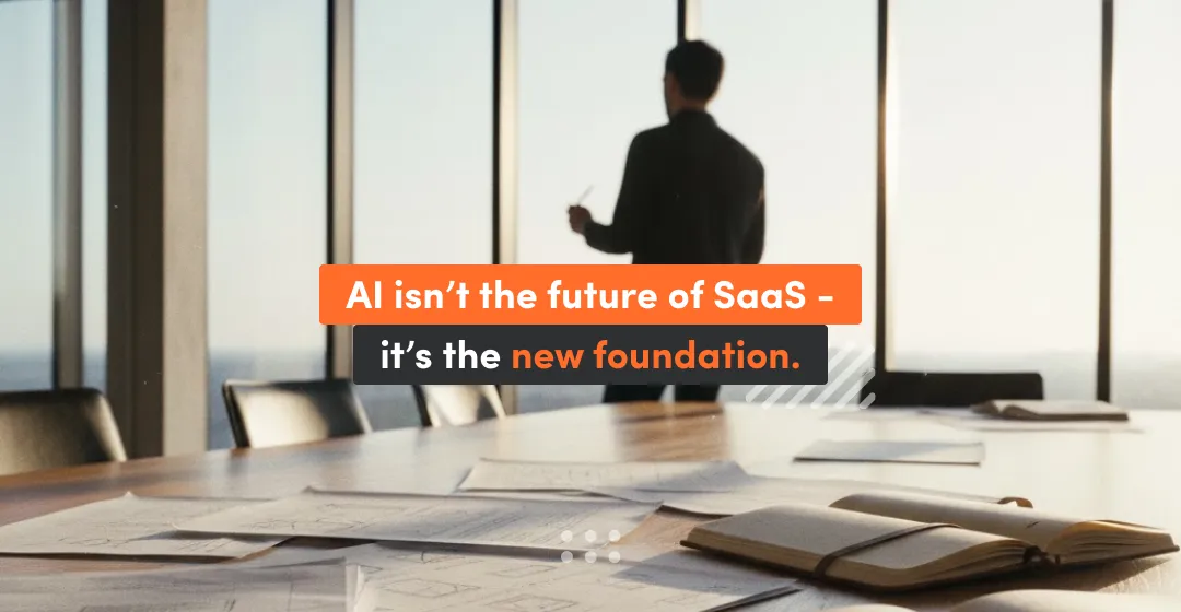 man standing in front of the window with inscription about the future of SaaS