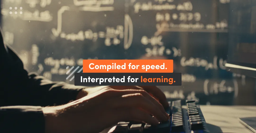 Close-up of hands typing on a keyboard with code and equations in the background, symbolizing how compiled languages focus on speed and performance while interpreted languages support flexibility, experimentation, and learning.