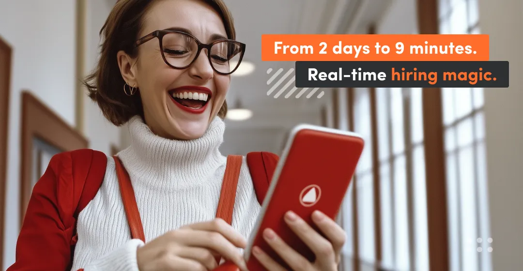 Laughing woman with red phone