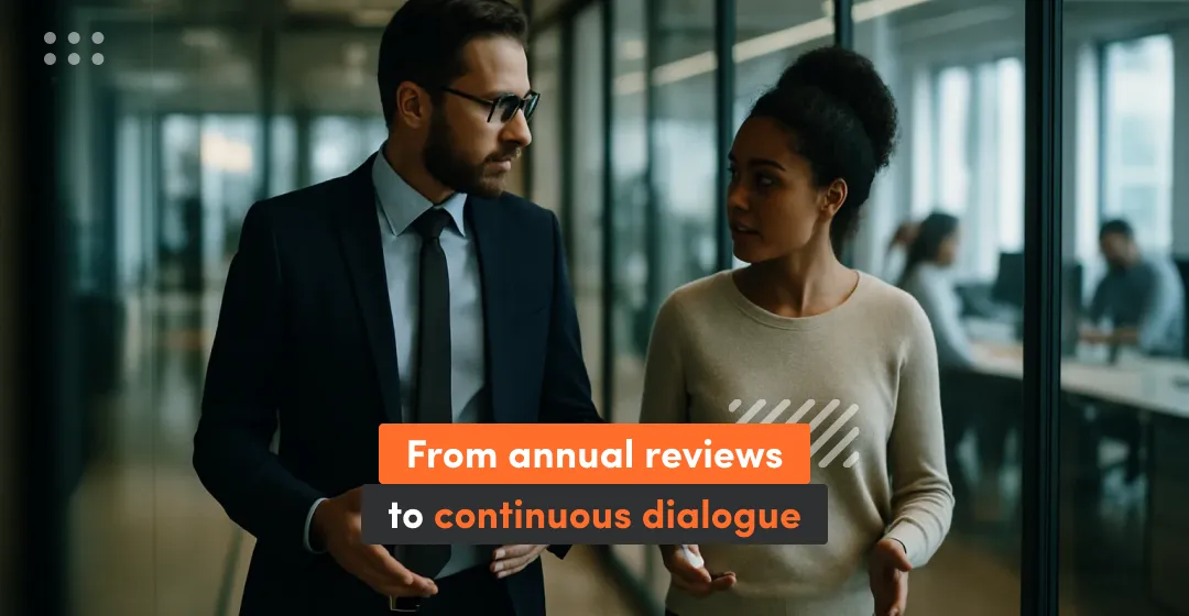 two people at the office talking and inscription about annual reviews