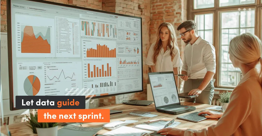 Group meeting in ofice with inscription about guiding through data