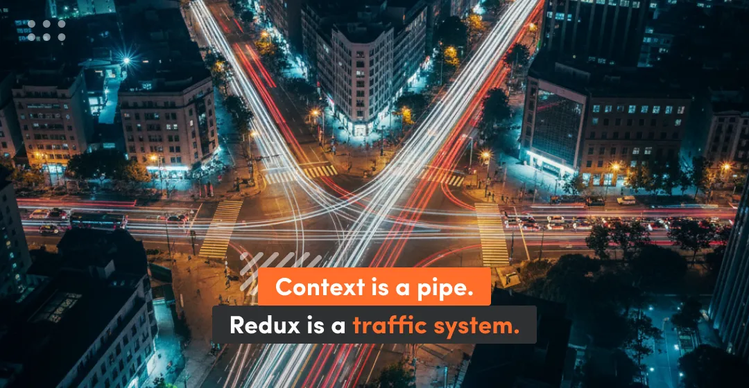 Aerial view of city traffic at night illustrating data flow, symbolizing how Redux manages complex state like a traffic system compared to simple Context pipelines in React.