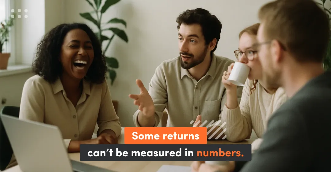 Four people on a meeting and inscription "some returns can't be measured in numbers"
